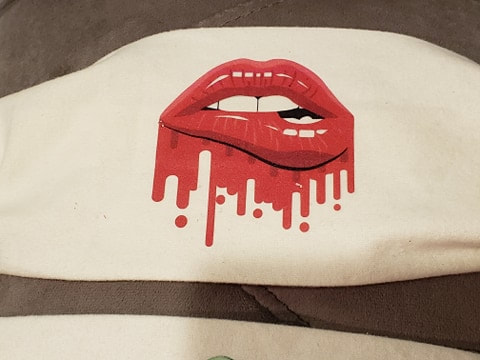 Red lips on plain mask